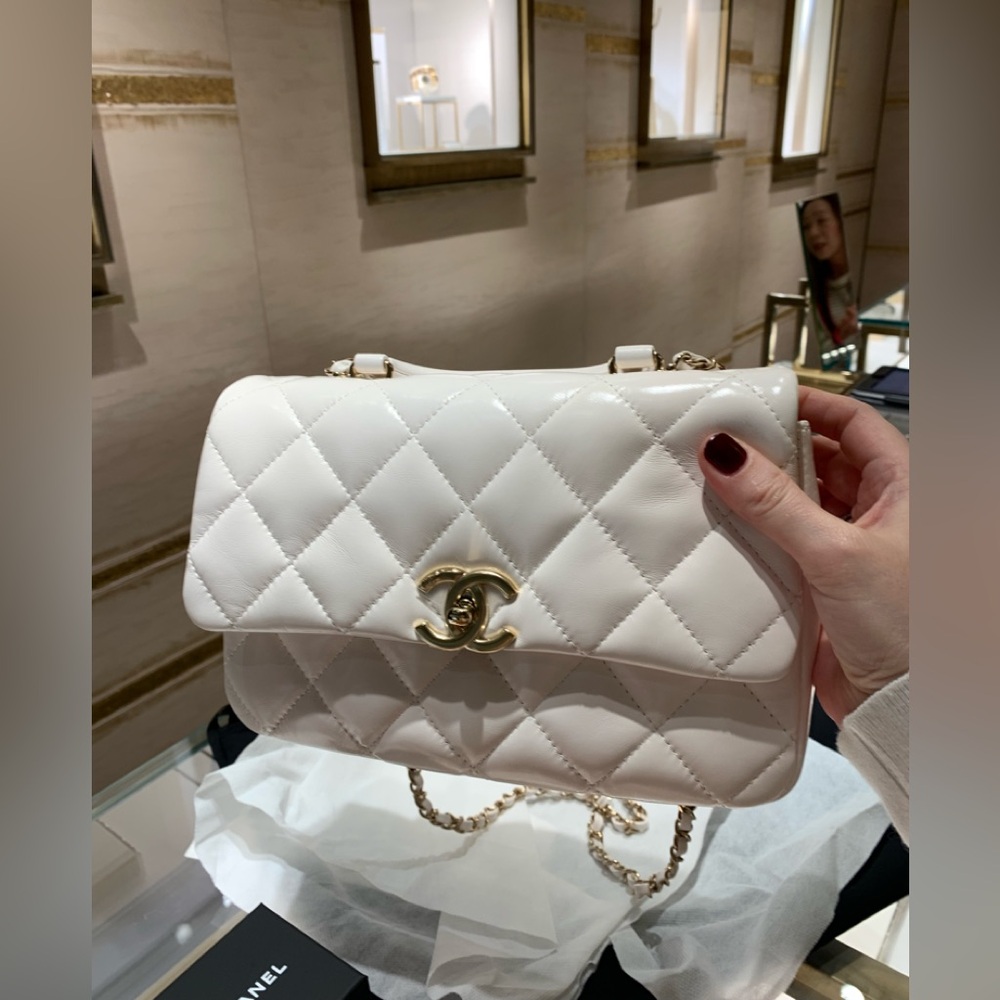 Brand new stunning authentic,new season Chanel purse w/ handle /strap. Must have